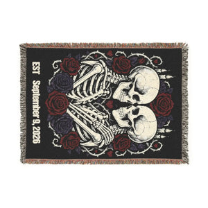 Mirrored skull pair forming a rose heart on this DipaliZ woven throw