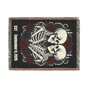 Serif date banner beneath the skulls on this DipaliZ woven blanket
