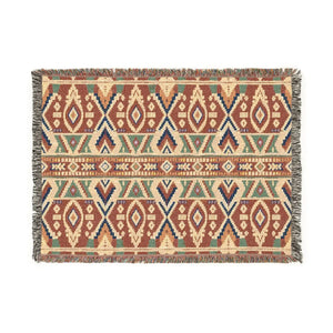 Earth-tone geometric blanket by DipaliZ for rustic interiors