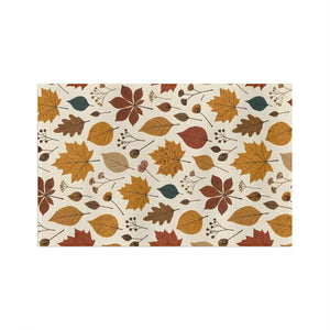 Maple leaf detail from the DipaliZ amber and teal tea towel print