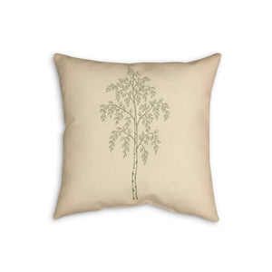 Branches cropping at the top edge of the DipaliZ birch botanical pillow