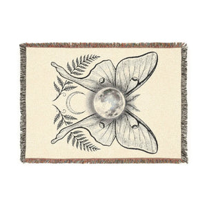 Luna moth wing design on a DipaliZ throw blanket in pale green and bone