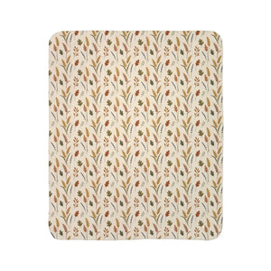 Pressed-leaf style motif detail on a DipaliZ fleece blanket