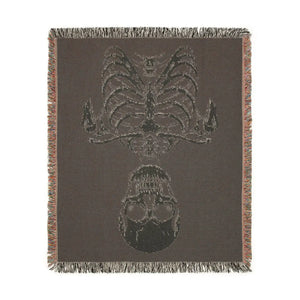 DipaliZ gothic skeleton blanket used as a sofa throw for dark home decor