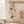 Hemmed cream kitchen towel from DipaliZ with a dried bloom motif