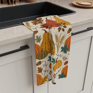 Curled leaves, pumpkins and acorns on a DipaliZ microfiber tea towel