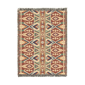 DipaliZ woven blanket with stair-stepped triangles across its width