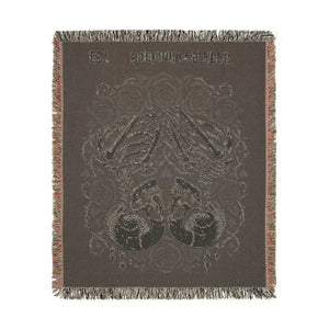 52 by 37 inch DipaliZ kissing skulls blanket sized for a chair