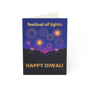 Silhouette rooftops and window lights under the DipaliZ fireworks