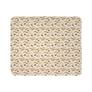 DipaliZ heavy sherpa throw folded in a guest bedroom
