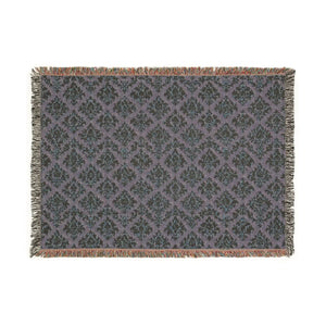 Multi-color chevron banding woven into a DipaliZ decorative throw blanket