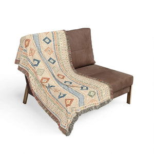 Neutral boho blanket by DipaliZ with a repeating diamond band