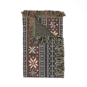 Fringed edge detail on a DipaliZ woven throw for a chair back or bed end