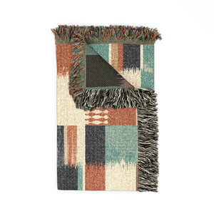 Trading blanket sampler motif printed on a DipaliZ woven throw