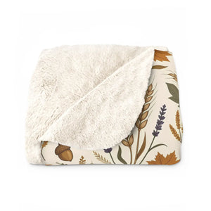 Lap-size DipaliZ sherpa blanket printed with a harvest leaf pattern