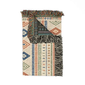 Cozy fringed southwestern woven throw by DipaliZ for a living room