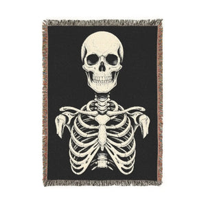 DipaliZ woven skeleton blanket sized 52 by 37 inches for an armchair