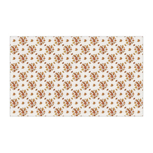 Warm rust and olive leaf colorway on the DipaliZ printed tea towel