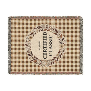 Personalized plaid woven blanket from DipaliZ, shown with a sample age in the design