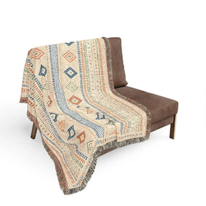 DipaliZ throw blanket with Aztec-inspired bands running the full width