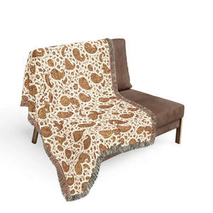 Boho design woven into the cloth of a DipaliZ jacquard throw blanket