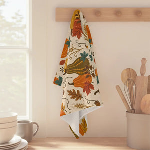 Warm cream ground and hemmed edges on a DipaliZ kitchen towel