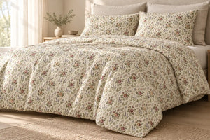 Small repeated florals reading as texture across a DipaliZ duvet cover