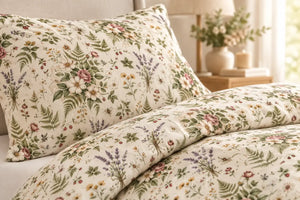 Loose meadow blooms scattered on white cotton in a DipaliZ duvet print