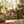 DipaliZ mushroom cottage throw pillow with a whimsical fairy house