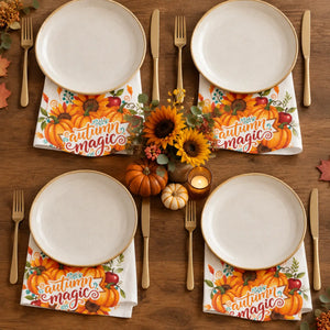 Painted pumpkins tucked among autumn florals on a DipaliZ dinner napkin