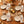 Small painted pumpkins forming a border on a DipaliZ autumn cloth napkin