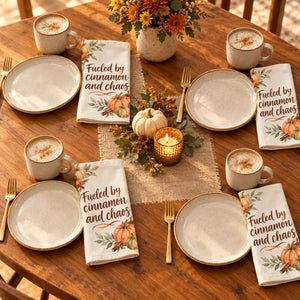Small painted pumpkins forming a border on a DipaliZ autumn cloth napkin