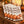 Uneven hand-lettered wording across a DipaliZ 18 inch autumn napkin