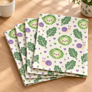 Cabbage heads with faces in the outer leaves on a DipaliZ veggie napkin