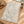 Raised waffle weave carrying bold leaf silhouettes on a DipaliZ hand towel
