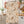 Rust and amber leaves tilted across the white waffle grid of a DipaliZ towel