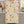 Ochre-toned wildflower print on both faces of a DipaliZ kitchen towel