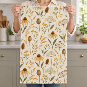 Ochre-toned wildflower print on both faces of a DipaliZ kitchen towel