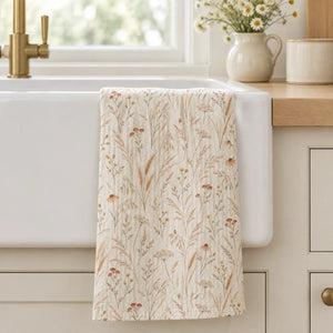 Seed heads and umbels drawn in outline on a DipaliZ waffle kitchen towel