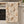 DipaliZ neutral foliage waffle towel in white, 16 by 25 inches, double-sided