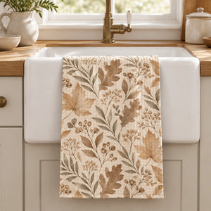 Taupe and muted olive leaves spaced across a white DipaliZ waffle weave