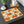 Pumpkins, gourds and falling leaves on a DipaliZ cotton twill placemat
