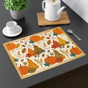 Pumpkins, gourds and falling leaves on a DipaliZ cotton twill placemat