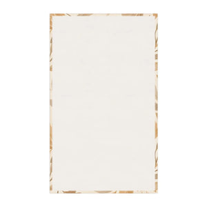 Layered watercolor leaf shapes on neutral DipaliZ kitchen linen