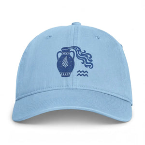 Detail of the stitched water bearer pottery motif on a DipaliZ Aquarius cap
