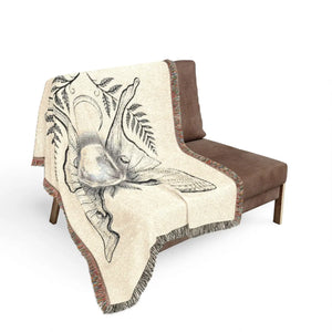 Cool green and bone palette on the DipaliZ luna moth woven blanket