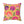 A square throw pillow featuring a retro-style floral pattern with smiling, winking, and surprised flower faces in pink, purple, and orange on a mustard yellow background.