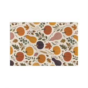 Wheat stalks linking the motifs on a DipaliZ autumn tea towel