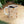 Wrap-around floral arrangement on a DipaliZ ceramic mug, no blank back
