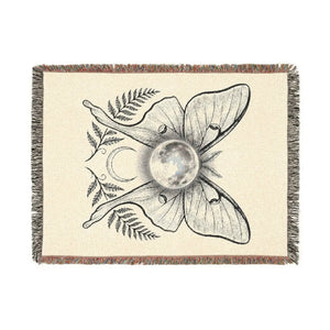 Woven throw blanket by DipaliZ showing symmetrical luna moth wings